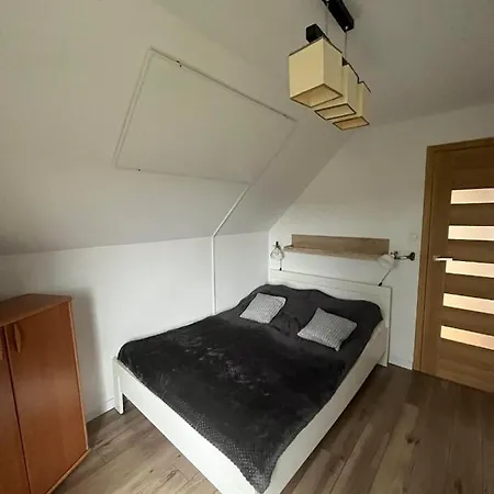 Dom Pod świerkiem *